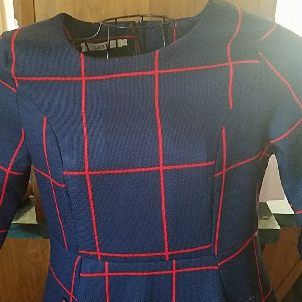 Cute Sunday Dress size is XL fits LIKE a Med